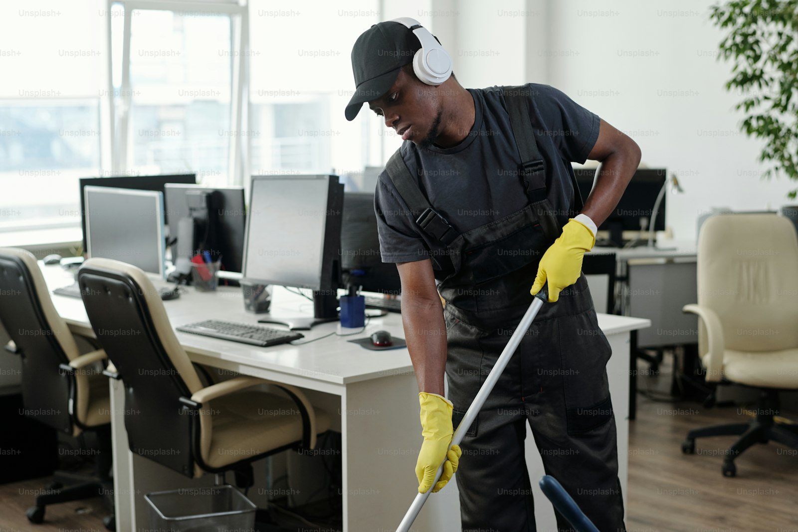 Commercial cleaner mopping office floor